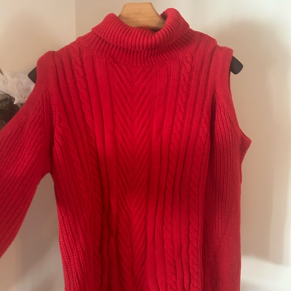 Large cold shoulder cable knit sweater